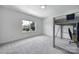 Bright bedroom with a bunk bed and a window overlooking the green yard at 2148 Nims Village Dr, Fort Mill, SC 29715