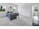 Neutral bedroom features a bunk bed and two windows that bring natural light to the space at 2148 Nims Village Dr, Fort Mill, SC 29715