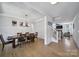Open concept dining room features hardwood floors and ample natural light at 2148 Nims Village Dr, Fort Mill, SC 29715