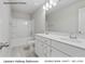 Upstairs hallway bathroom featuring a double bowl vanity at 217 Lake George Dr, Shelby, NC 28152