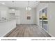 Bright kitchen and breakfast area with stainless steel appliances and a sliding glass door at 217 Lake George Dr, Shelby, NC 28152