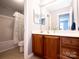 Bathroom featuring a shower/tub combo and plenty of storage space at 219 Harrowfield Hts, York, SC 29745