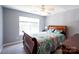 Comfortable bedroom featuring a window, neutral paint, and stylish comforter at 219 Harrowfield Hts, York, SC 29745