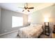 Comfortable bedroom featuring a ceiling fan, neutral paint, and lots of natural light at 219 Harrowfield Hts, York, SC 29745