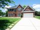 Beautiful brick home with a well-maintained lawn and concrete driveway at 219 Harrowfield Hts, York, SC 29745