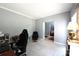 Office with gray walls and carpet, featuring a desk and chair at 219 Harrowfield Hts, York, SC 29745