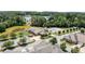 Overhead view of a property with a serene lake, pool, and beautifully landscaped surroundings at 2484 Early Richmond Ct, Denver, NC 28037