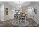 Cozy dining area with stylish decor, adjacent to the kitchen, perfect for Gathering meals at 2484 Early Richmond Ct, Denver, NC 28037
