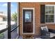 Charming screened porch entryway with a decorative door and stylish décor at 2484 Early Richmond Ct, Denver, NC 28037