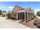 Charming brick home with a screened-in porch and beautifully landscaped yard at 2484 Early Richmond Ct, Denver, NC 28037