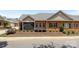 Brick home showcasing a screened porch and well-kept landscaping at 2484 Early Richmond Ct, Denver, NC 28037