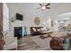 Inviting living room features a fireplace and a comfortable seating area, perfect for relaxation at 2484 Early Richmond Ct, Denver, NC 28037