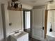 Bathroom featuring a single sink vanity, a vintage light fixture, and a shower/tub combo at 30497 Orchard Ln, Albemarle, NC 28001