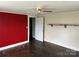 Bedroom with hardwood flooring and a large window at 30497 Orchard Ln, Albemarle, NC 28001