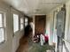 Hallway and entrance with a variety of doors and a light at 30497 Orchard Ln, Albemarle, NC 28001
