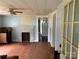 Living room with decorative fireplace and hardwood floors at 30497 Orchard Ln, Albemarle, NC 28001