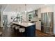 Modern kitchen with a large island, stainless steel appliances, and elegant pendant lighting at 3165 Pendleton Ave, Charlotte, NC 28210