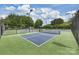 Well-maintained tennis and pickleball courts with professional lighting for evening play at 3165 Pendleton Ave, Charlotte, NC 28210