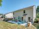 Spacious backyard with patio furniture and a well-maintained lawn at 3511 Dominion Green Dr, Charlotte, NC 28269