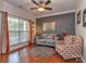 Cozy living room with hardwood floors, natural light, and stylish furnishings at 3511 Dominion Green Dr, Charlotte, NC 28269