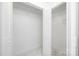 Walk-in closet featuring hardwood floors and ample storage space at 4017 Sulkirk Rd, Charlotte, NC 28210