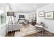 Cozy living room featuring neutral decor, stylish furnishings, and plenty of natural light at 4017 Sulkirk Rd, Charlotte, NC 28210
