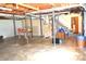 An unfinished basement is being used for storage, with exposed ductwork and support beams at 405 Wesley Heights Dr, Albemarle, NC 28001