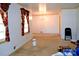 Sunny dining room with bright neutral walls and decorative window treatments at 405 Wesley Heights Dr, Albemarle, NC 28001