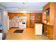 Spacious eat-in kitchen area with appliances and built-in shelving at 405 Wesley Heights Dr, Albemarle, NC 28001