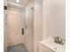 Modern bathroom features tiled shower with glass door and updated vanity at 408 Orange St, Shelby, NC 28150