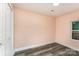 Cozy bedroom with wood-look flooring and natural light from a new window at 408 Orange St, Shelby, NC 28150