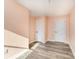 Bedroom with fresh paint, wood-look floors, and closet storage at 408 Orange St, Shelby, NC 28150