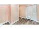 Hallway with wood-look floors and neutral paint, offering a spacious feel at 408 Orange St, Shelby, NC 28150