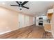 Open concept living room and kitchen featuring wood floors at 408 Orange St, Shelby, NC 28150