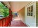 Covered porch and a bright white entry door at 408 Orange St, Shelby, NC 28150