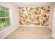 Comfortable bedroom with bright geometric wall and carpet flooring at 506 Broadway Ct, Statesville, NC 28677