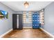 Spacious bedroom featuring hardwood floors, modern closet and bright blue lockers at 506 Gold St, Shelby, NC 28150