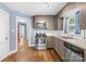 This kitchen is equipped with stainless steel appliances and ample counter space, perfect for everyday meals at 506 Gold St, Shelby, NC 28150
