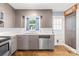 Well-lit kitchen featuring modern appliances, ample counter space, and stylish fixtures for convenient cooking at 506 Gold St, Shelby, NC 28150