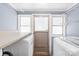 Functional laundry room with washer, dryer, and ample counter space at 506 Gold St, Shelby, NC 28150