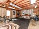 Spacious garage interior setup for a home gym with exposed beams and ample lighting at 5105 Hampton Meadows Rd, Monroe, NC 28110