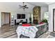 Comfortable living room featuring a stone fireplace and inviting decor at 5105 Hampton Meadows Rd, Monroe, NC 28110
