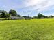 Expansive backyard on a sunny day, perfect for outdoor activities and relaxation at 5105 Hampton Meadows Rd, Monroe, NC 28110