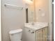 Bathroom with a single sink vanity and neutral walls at 5424 Amado St, Charlotte, NC 28215
