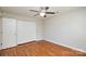 Bedroom features hardwood floors, neutral walls, and a closet at 5424 Amado St, Charlotte, NC 28215