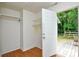 A mudroom with built in shelves and access to the deck at 5424 Amado St, Charlotte, NC 28215