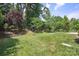 This sprawling backyard offers ample room for gardens, landscaping, and recreation at 5524 Elk Knob Ct, Denver, NC 28037