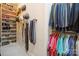Walk-in closet with custom shelves and ample hanging space to organize all clothing items at 5524 Elk Knob Ct, Denver, NC 28037
