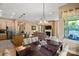 Open concept living/dining area with modern chandelier and views of the outdoor living spaces at 5524 Elk Knob Ct, Denver, NC 28037