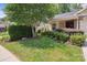 Well-manicured front yard with lush green grass and landscaping, enhancing curb appeal at 5524 Elk Knob Ct, Denver, NC 28037